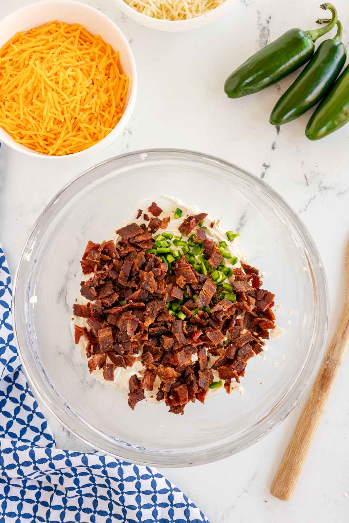 bowl of jalapeno popper dip with bacon it