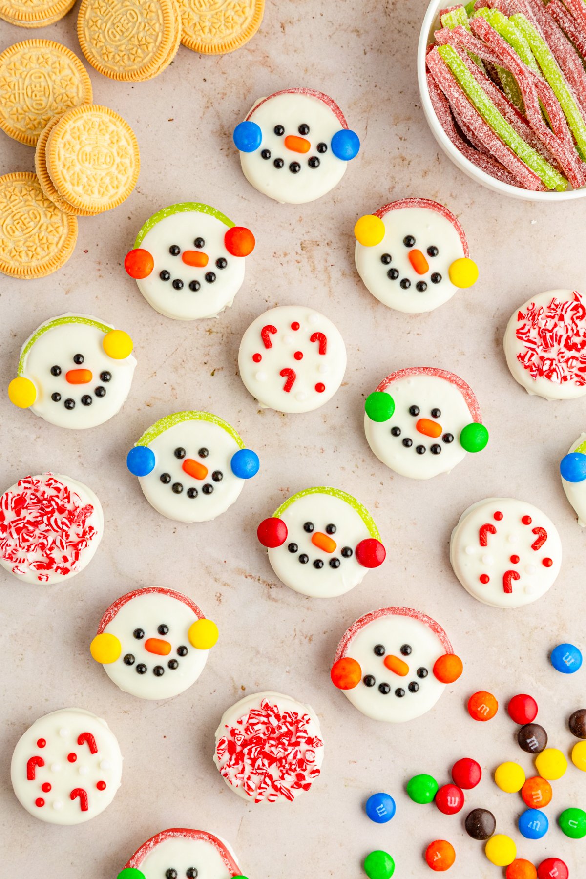 a bunch of chocolate covered Oreo snowmen