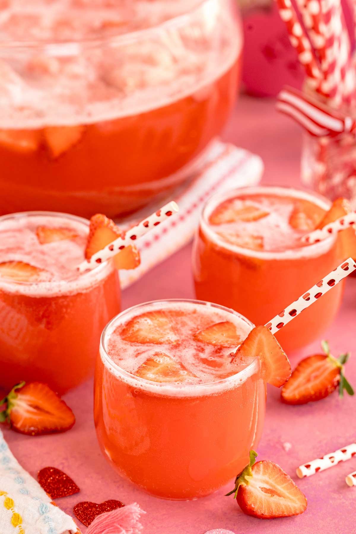 Glasses with strawberry punch and Valentine's Day straw