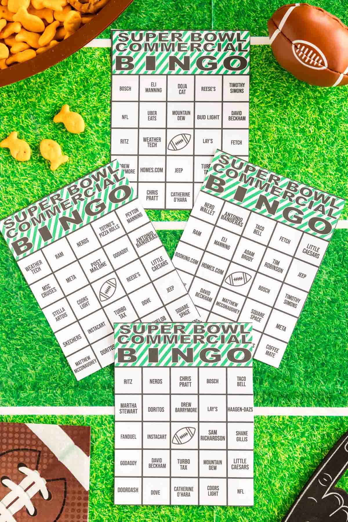 Super Bowl bingo cards on a green tablecloth