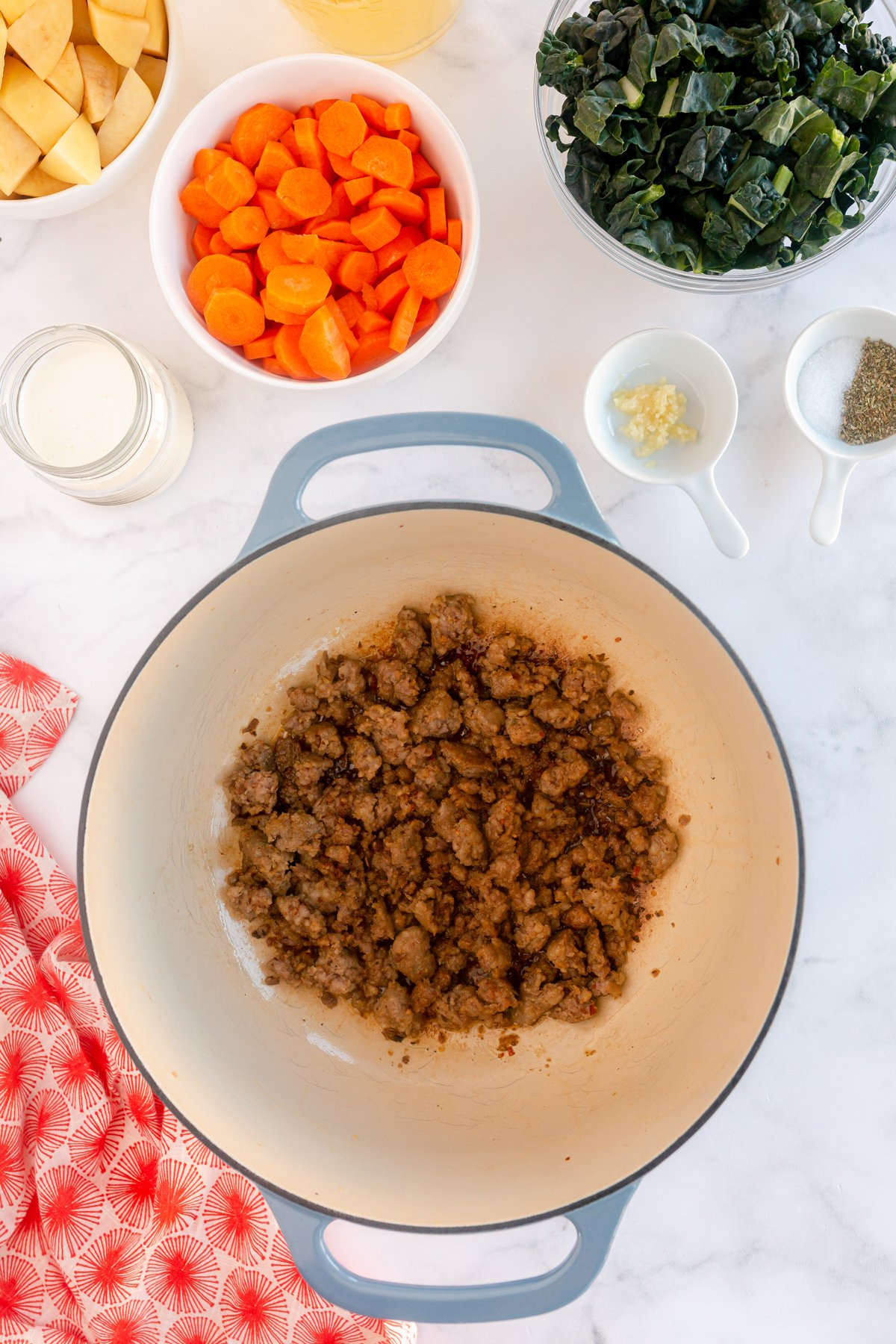 brown Italian sausage in a pan