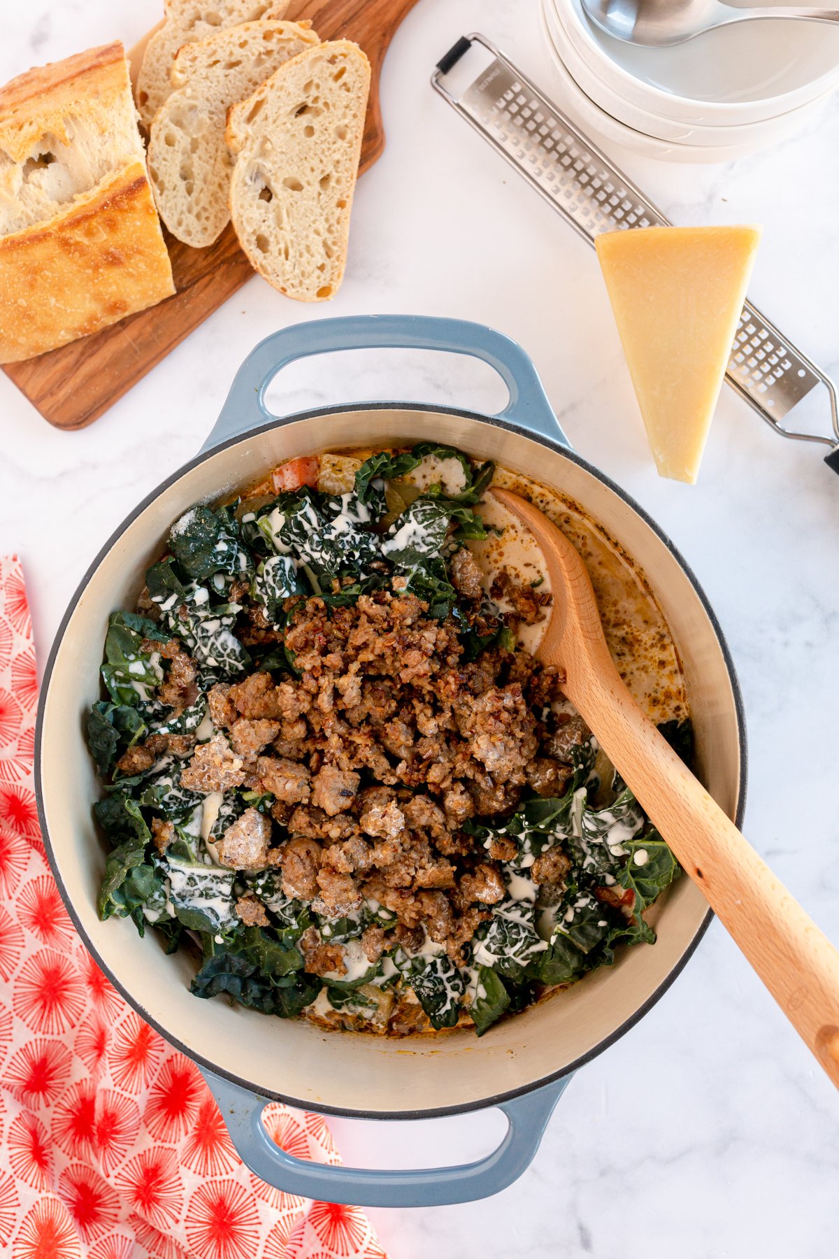 kale and sausage in a large pot 