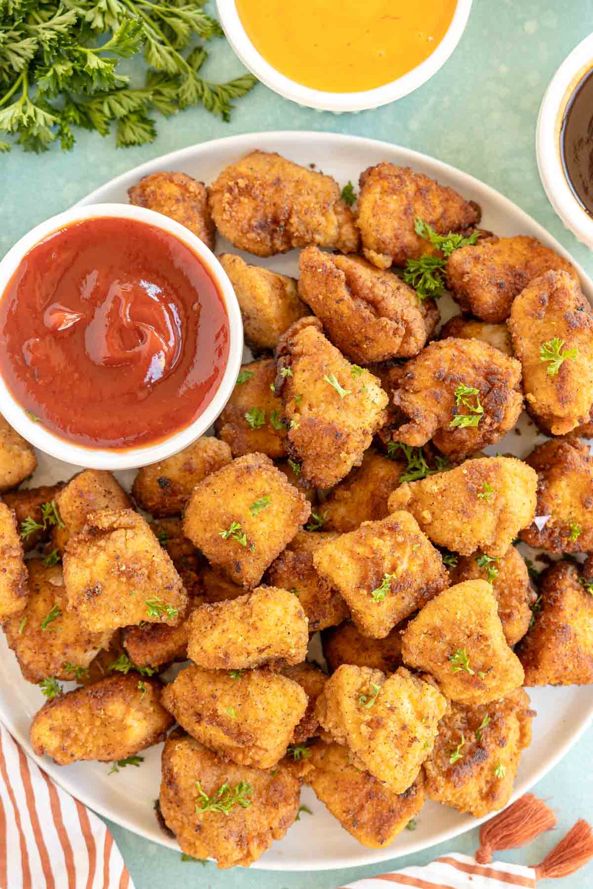 copycat chick-fil-a nuggets and ketchup on a white plate