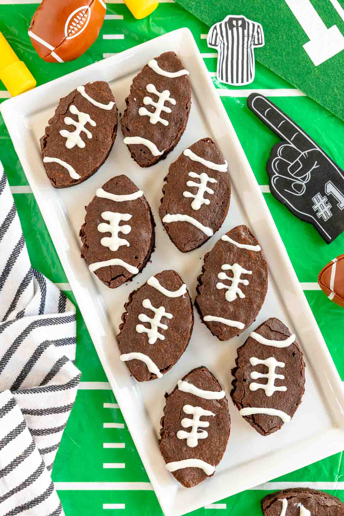 football brownies on a white rectangle serving tray