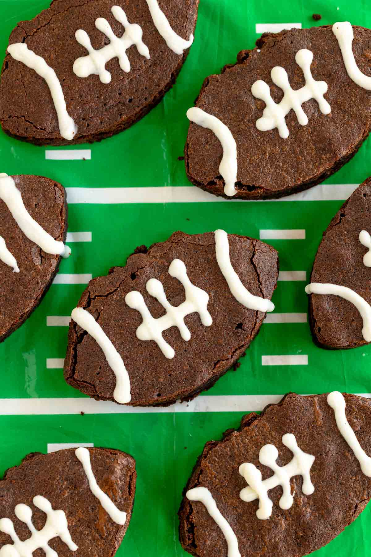 football brownies on a green tablecloth