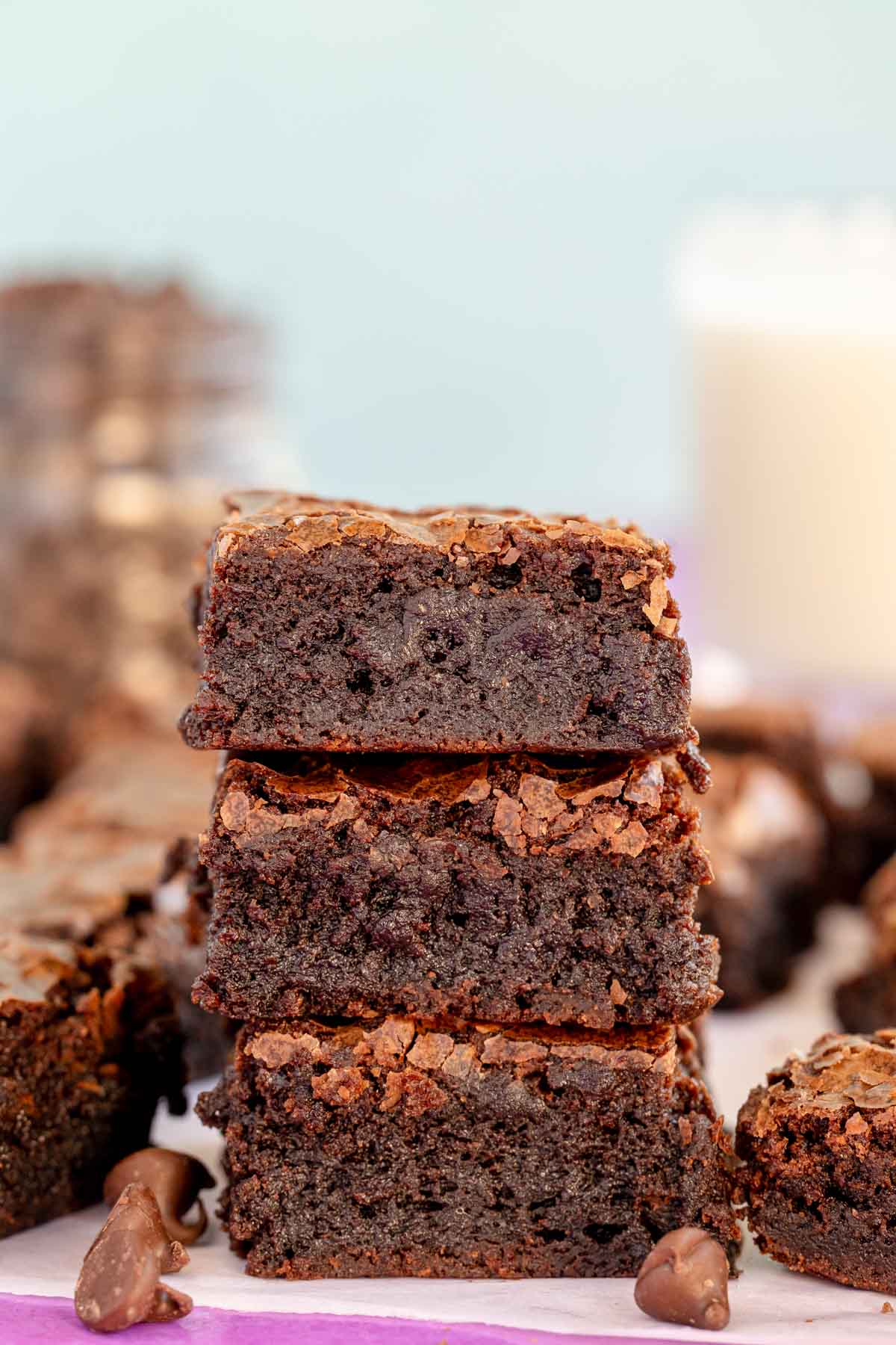 three fudgy homemade brownies stacked on top of each other